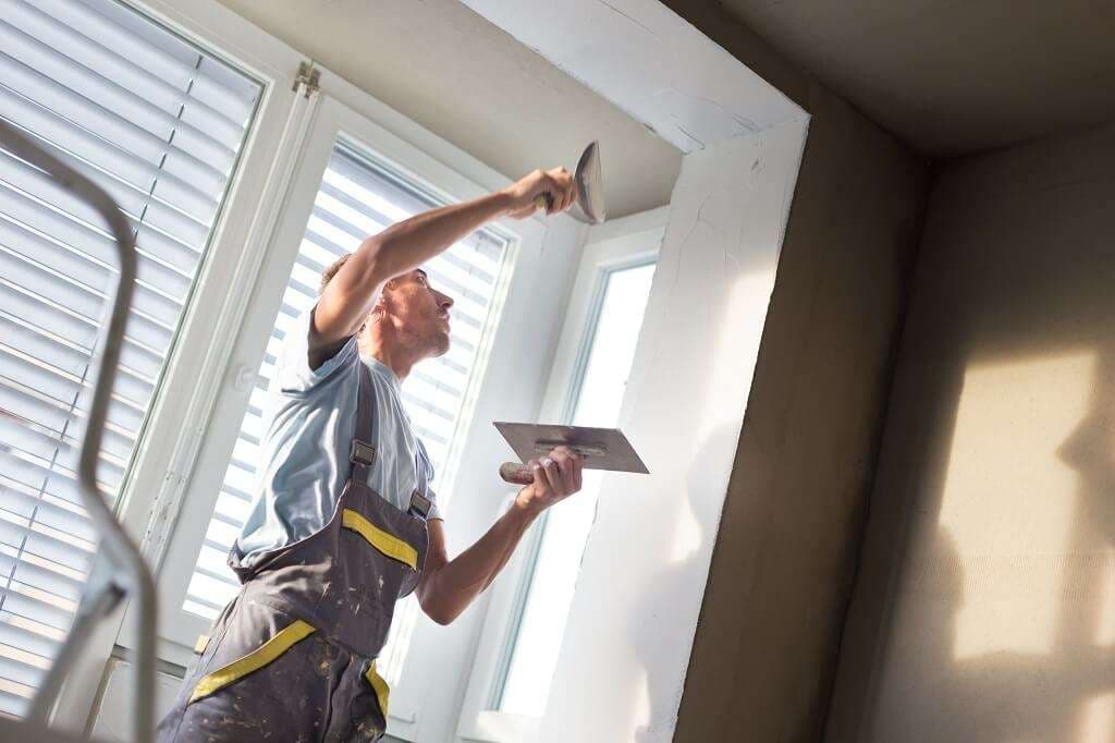 Plasterer working on a project