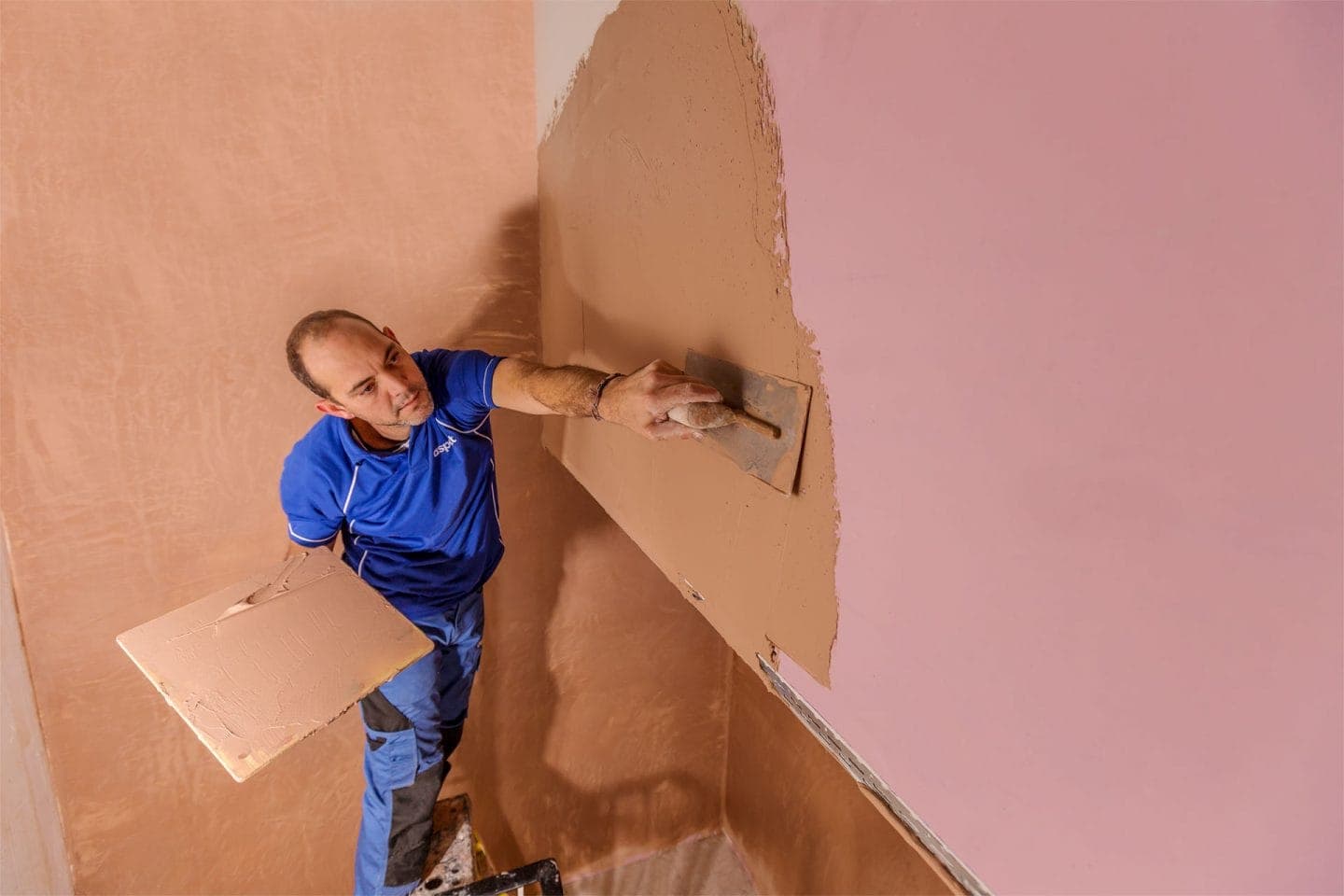 Plasterer working on a project