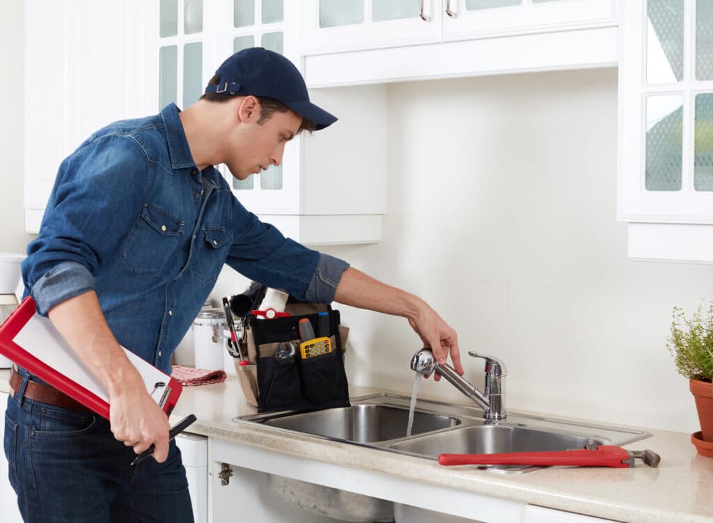 Plumber working on a project